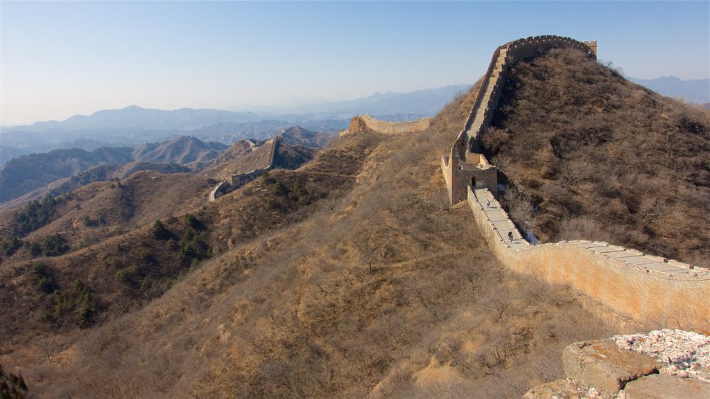 Jinshanling Great Wall mostrando patrimonio de arquitectura, una puesta de sol y vistas de paisajes