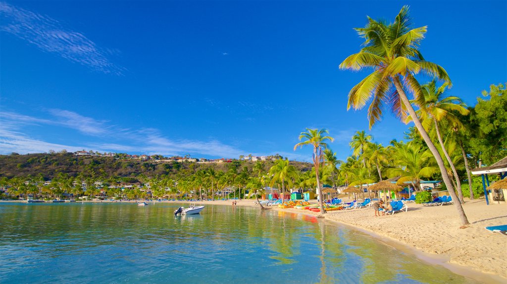 Mamora Bay showing a sandy beach, general coastal views and tropical scenes