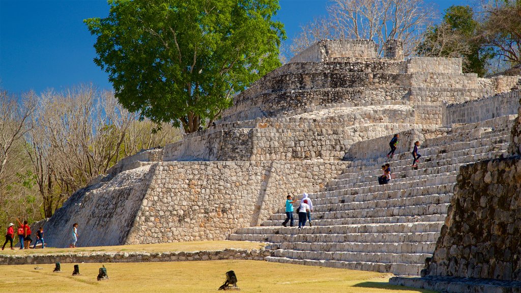 Edzna Ruins which includes heritage architecture as well as a small group of people