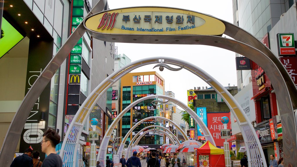 BIFF Square featuring city views, signage and a city