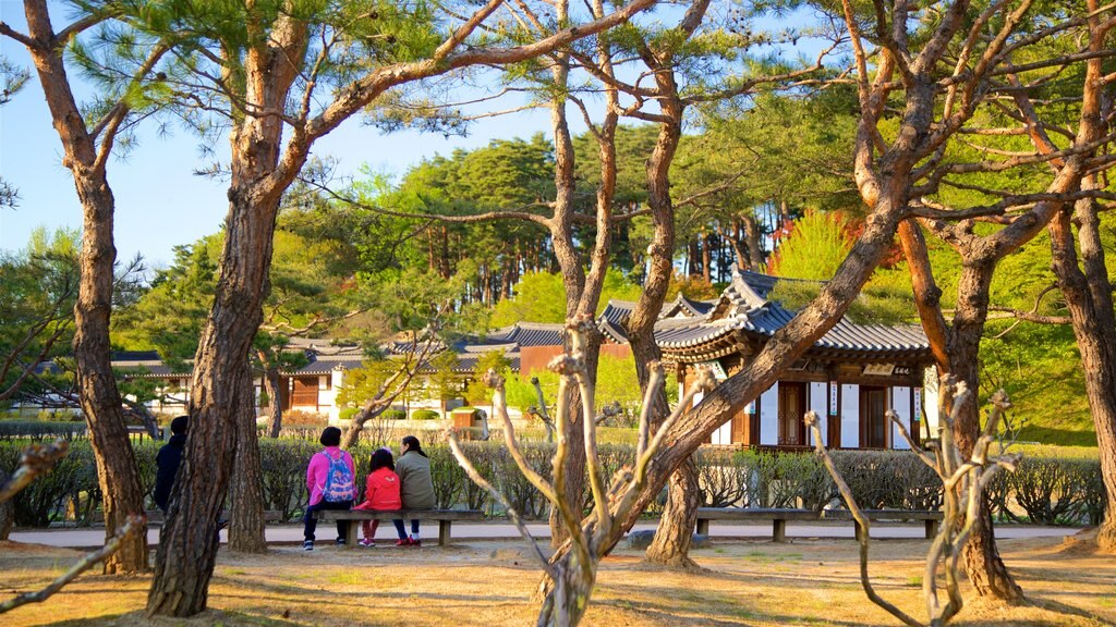 Gangneung Seongyojang House which includes a park as well as a family