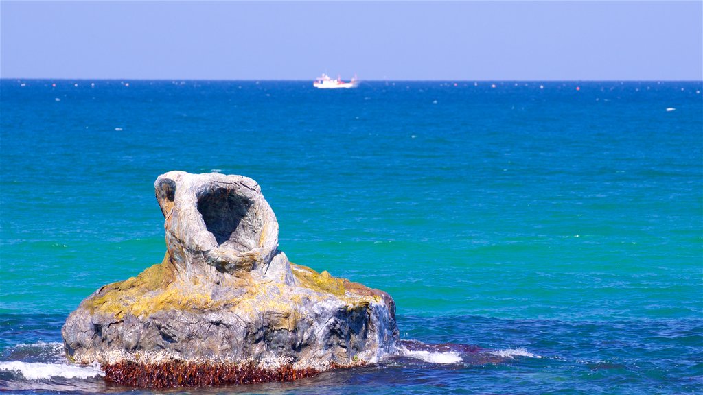 Anmok Beach which includes rocky coastline and general coastal views