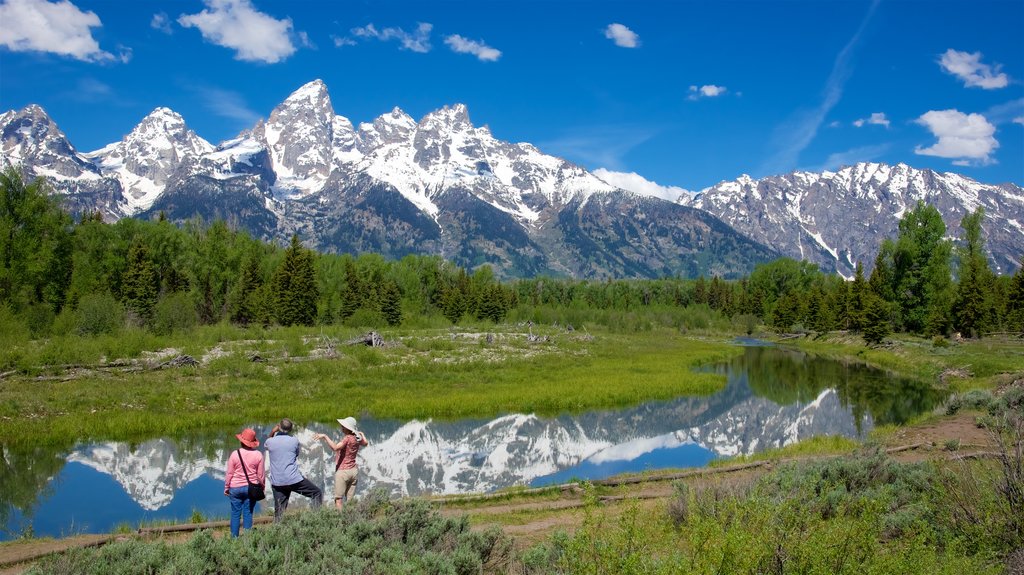 Schwabacher\'s Landing showing a river or creek, mountains and tranquil scenes