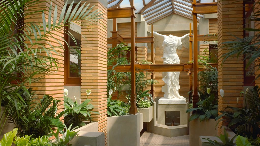 Frank Lloyd Wright\'s Darwin D. Martin House which includes a statue or sculpture, a garden and interior views