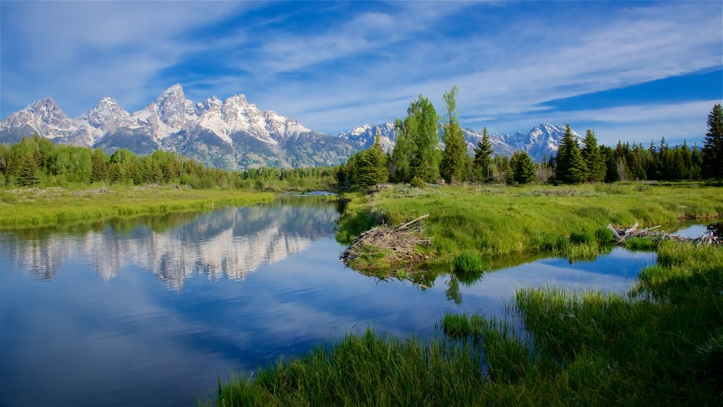 Schwabacher\'s Landing which includes a river or creek, tranquil scenes and mountains