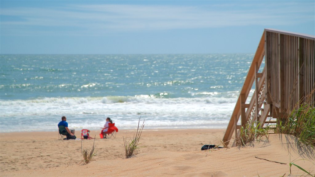 Bethany Beach ofreciendo vistas generales de la costa y una playa y también una pareja