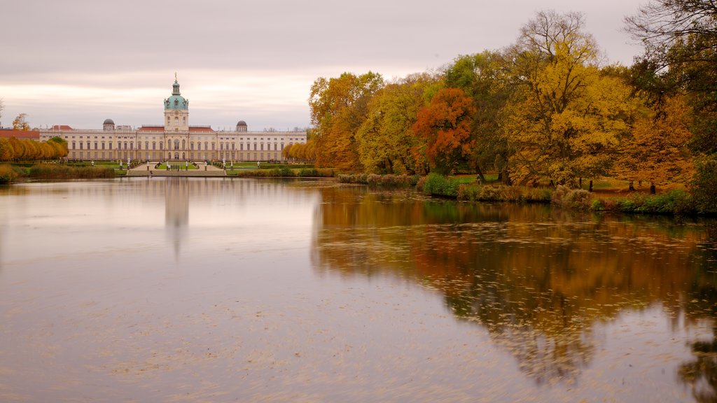 Schloss Charlottenburg showing heritage architecture, a sunset and a park