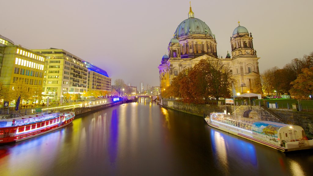 Museum Island which includes nightlife, a city and a river or creek