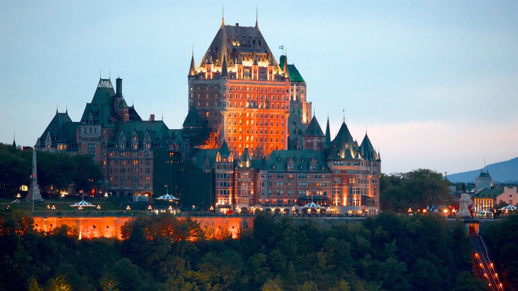 Le Château Frontenac which includes a sunset and heritage architecture