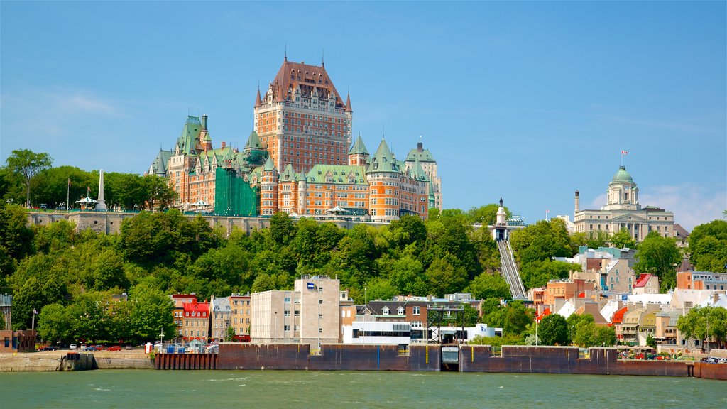 Le Château Frontenac featuring a bay or harbour and heritage architecture