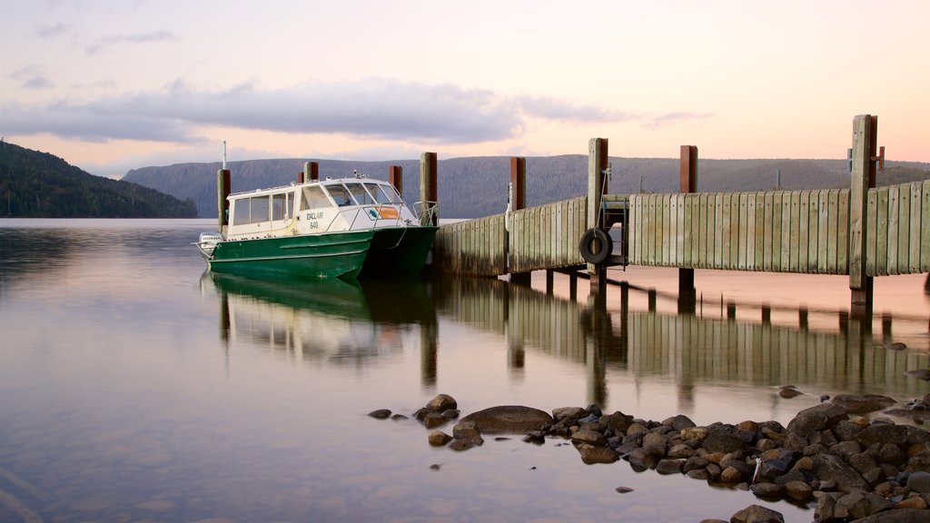 Lake St. Clair which includes a sunset and a bay or harbour