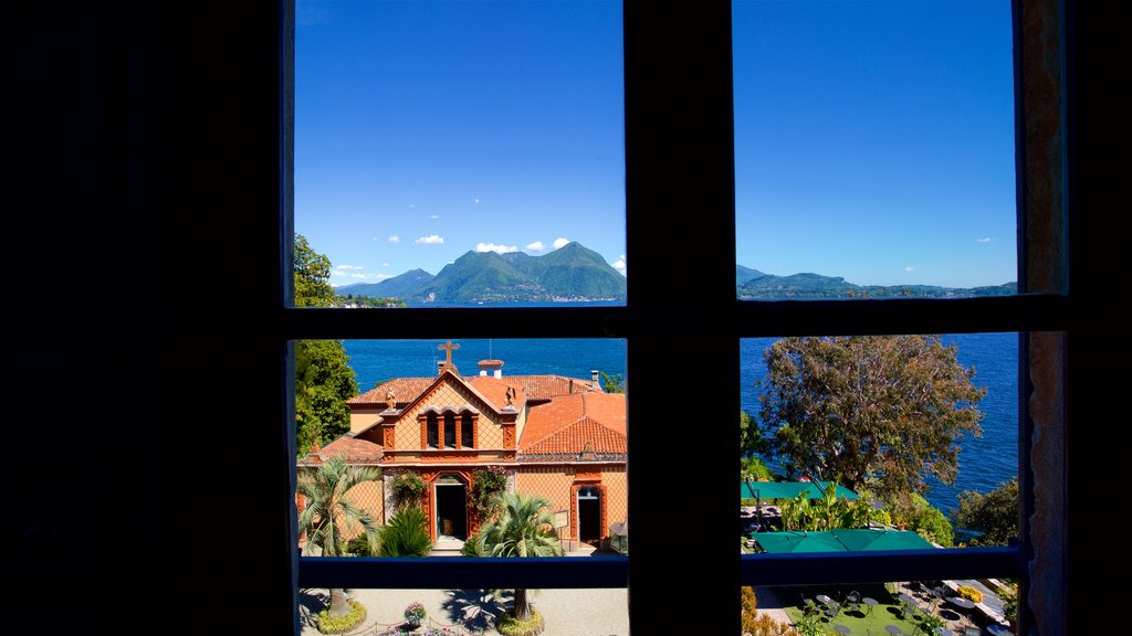 Isola Madre Botanical Garden showing interior views, a small town or village and a lake or waterhole