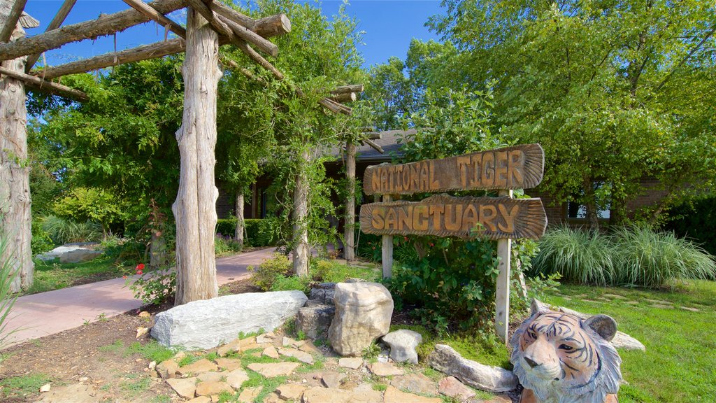 National Tiger Sanctuary showing signage and zoo animals