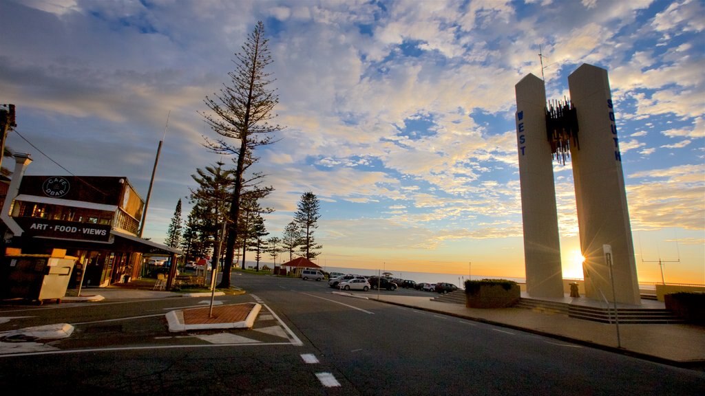 Point Danger featuring general coastal views, a monument and a sunset