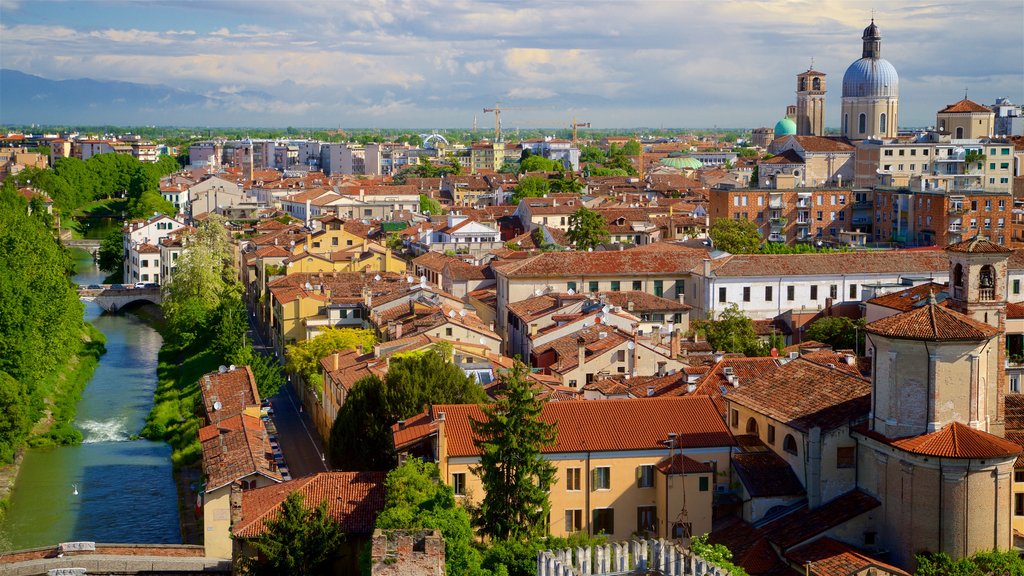 La Specola Observatory showing a city, landscape views and a river or creek