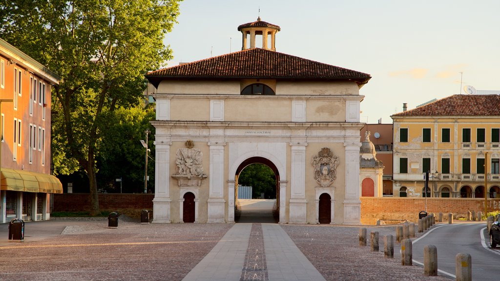 Porta Ognissanti showing a square or plaza, a sunset and heritage elements