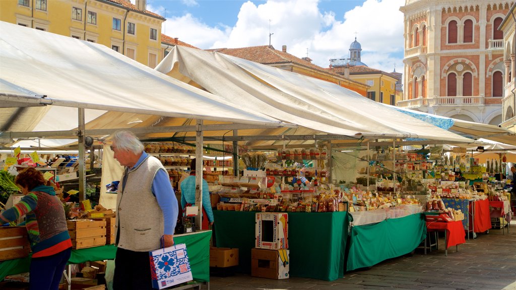 Piazza delle Erbe which includes street scenes and markets as well as a couple