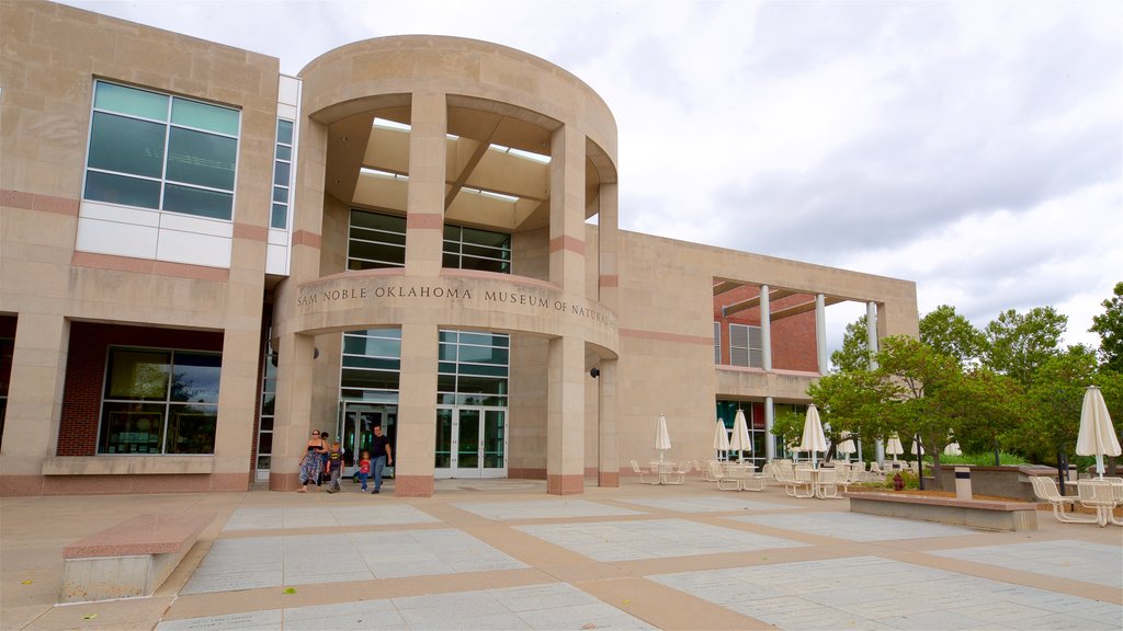 Sam Noble Oklahoma Museum of Natural History featuring a square or plaza as well as a family