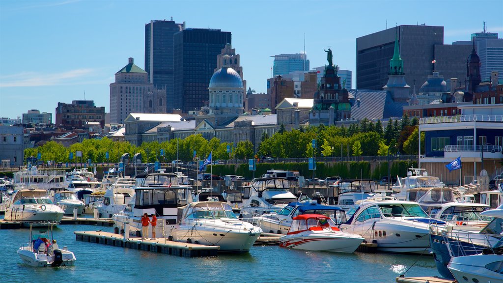 Montreal ofreciendo un edificio alto, una bahía o un puerto y una ciudad