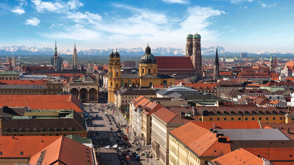 Church of Our Lady showing heritage architecture, a city and landscape views