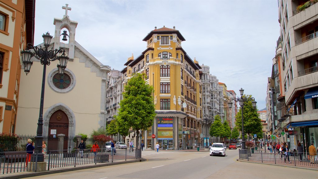 Calle Uria showing heritage elements, a city and a church or cathedral