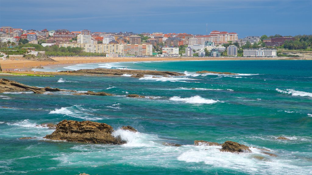 Magdalena Peninsula featuring rocky coastline, general coastal views and a sandy beach