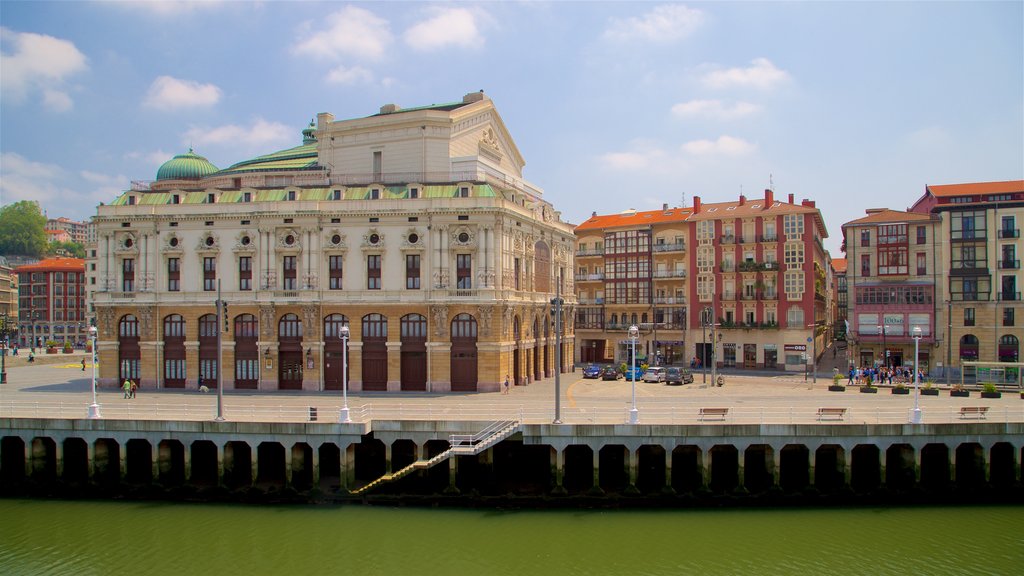 Arriaga Theater featuring heritage architecture, a bay or harbour and a city