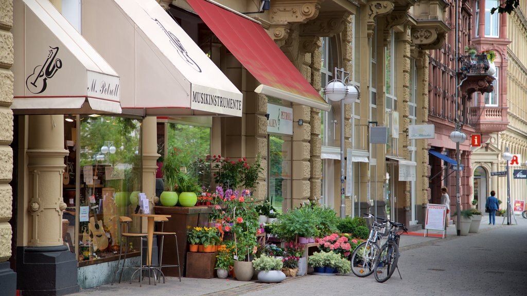 Marktbrunnen which includes heritage elements and flowers