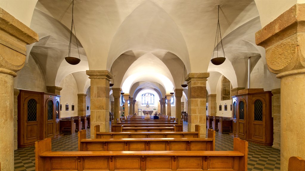 Paderborn Cathedral showing a church or cathedral, heritage elements and interior views