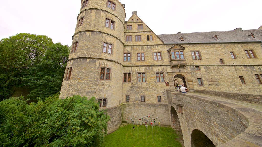 Kreismuseum Wewelsburg featuring a castle, a bridge and heritage architecture