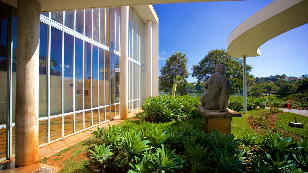 Pampulha Art Museum showing a statue or sculpture and a garden