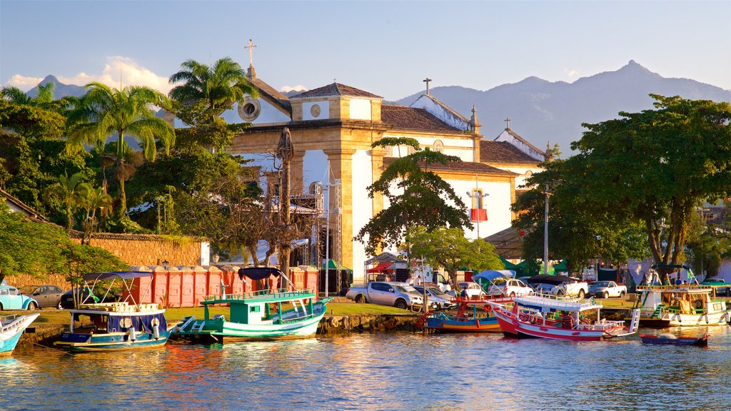 Church of Our Lady of the Remedies which includes a bay or harbour