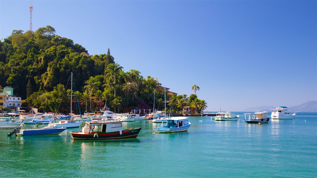 Bonfim Beach showing a bay or harbour and tropical scenes