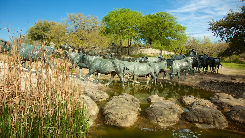 Pioneer Plaza which includes outdoor art and a statue or sculpture