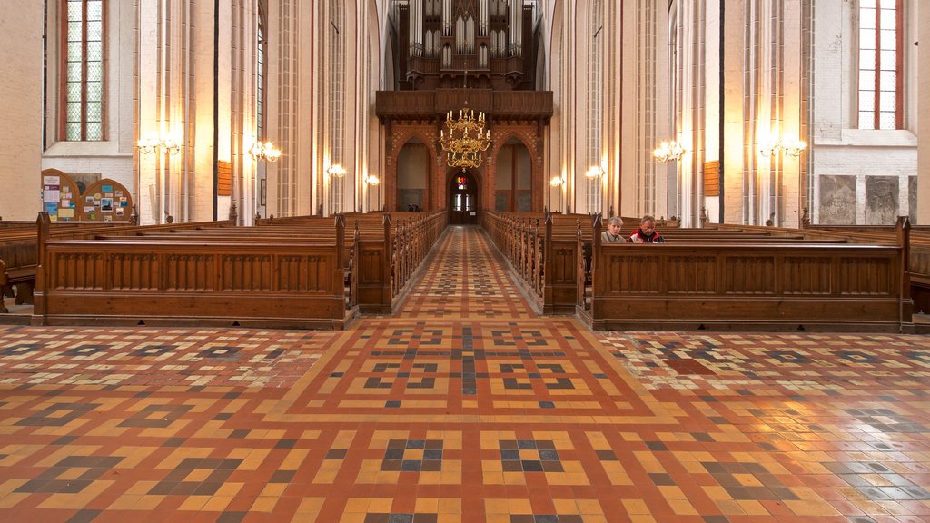 Schwerin Cathedral showing a church or cathedral, heritage elements and interior views