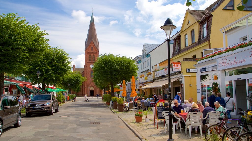 Warnemuende Church showing outdoor eating, a church or cathedral and heritage architecture