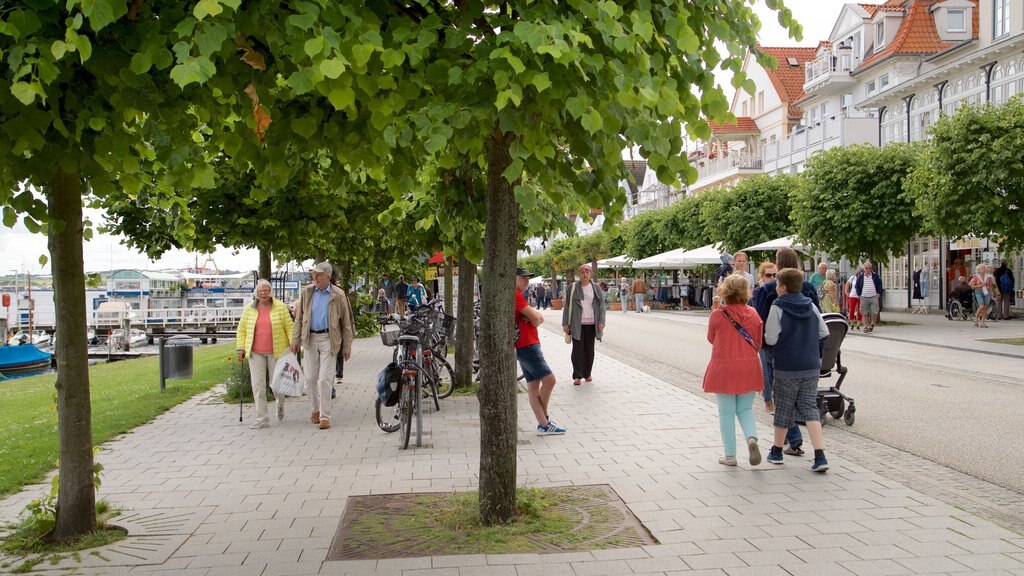 Travemuende featuring street scenes as well as a small group of people