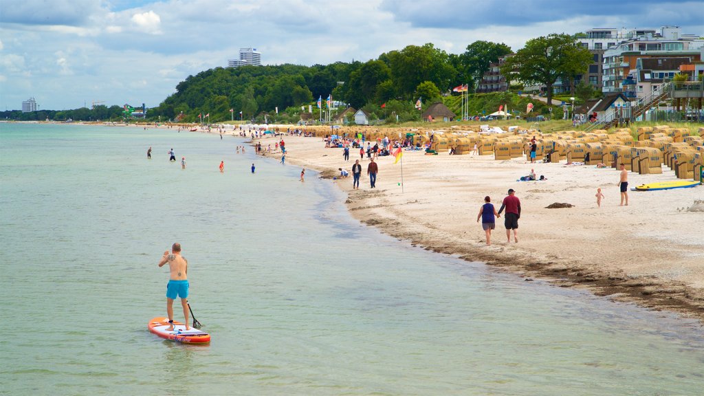 Scharbeutz which includes a sandy beach, general coastal views and kayaking or canoeing