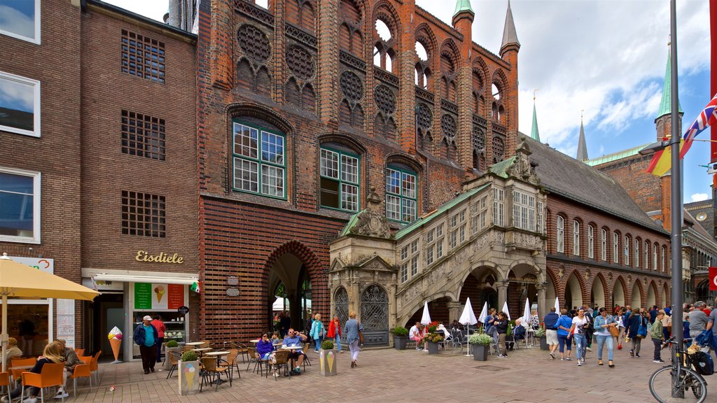 Rathaus showing heritage architecture and street scenes as well as a small group of people