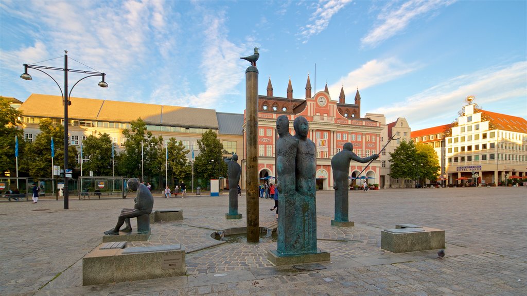 New Market caracterizando uma praça ou plaza, uma estátua ou escultura e arte ao ar livre