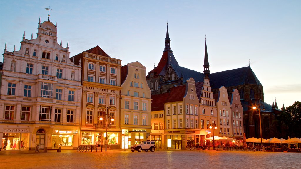 New Market showing heritage architecture, a square or plaza and night scenes