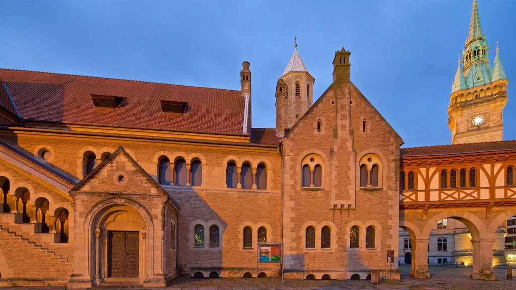 Dankwarderode Castle featuring a church or cathedral, night scenes and heritage architecture