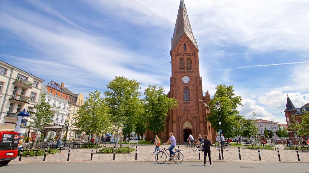 Warnemuende Church showing street scenes, heritage architecture and a church or cathedral