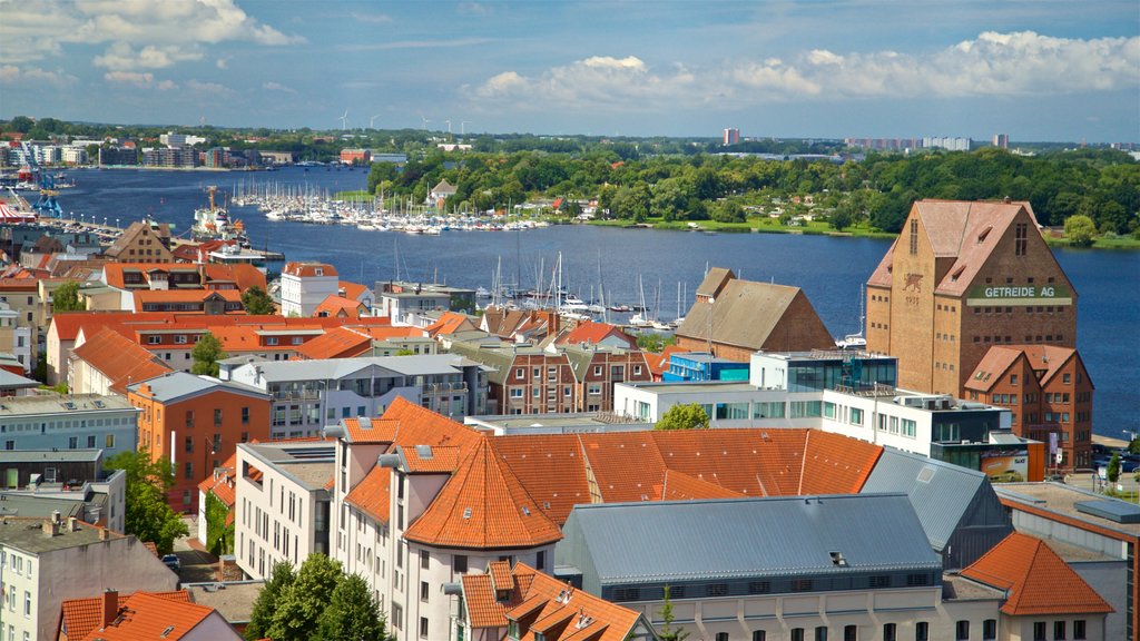 Petrikirche which includes a river or creek, a bay or harbour and a city