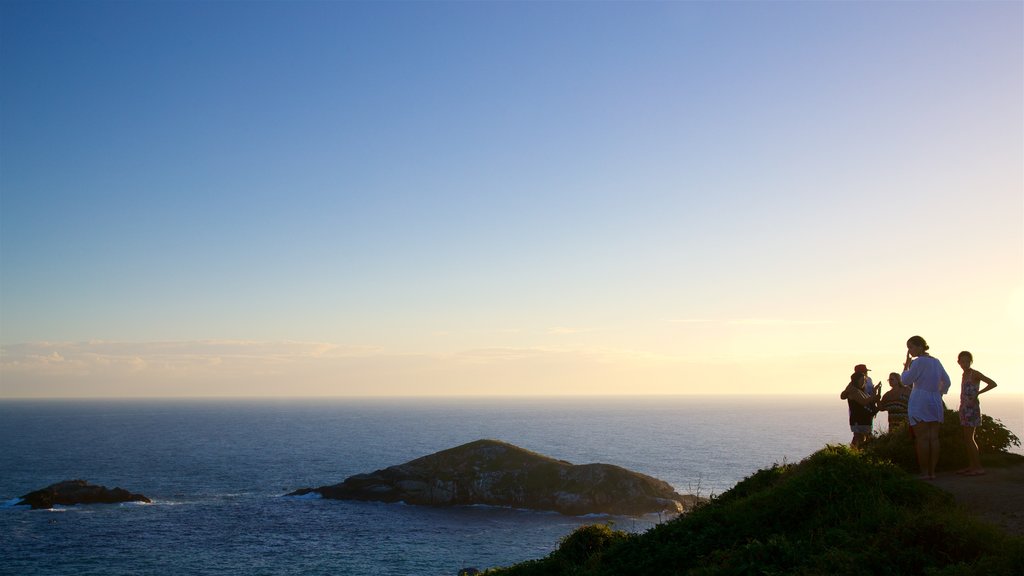 Atalaia Viewpoint showing a sunset, landscape views and island images