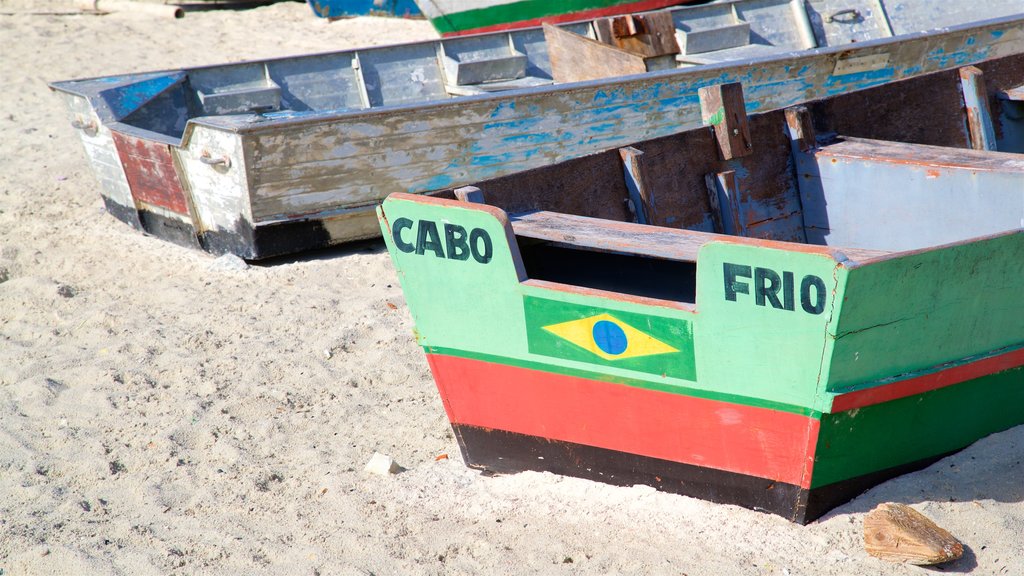 Prainha Beach featuring signage and a beach