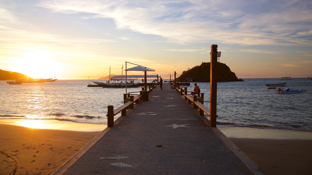 Orla Bardot showing a sunset, general coastal views and a sandy beach