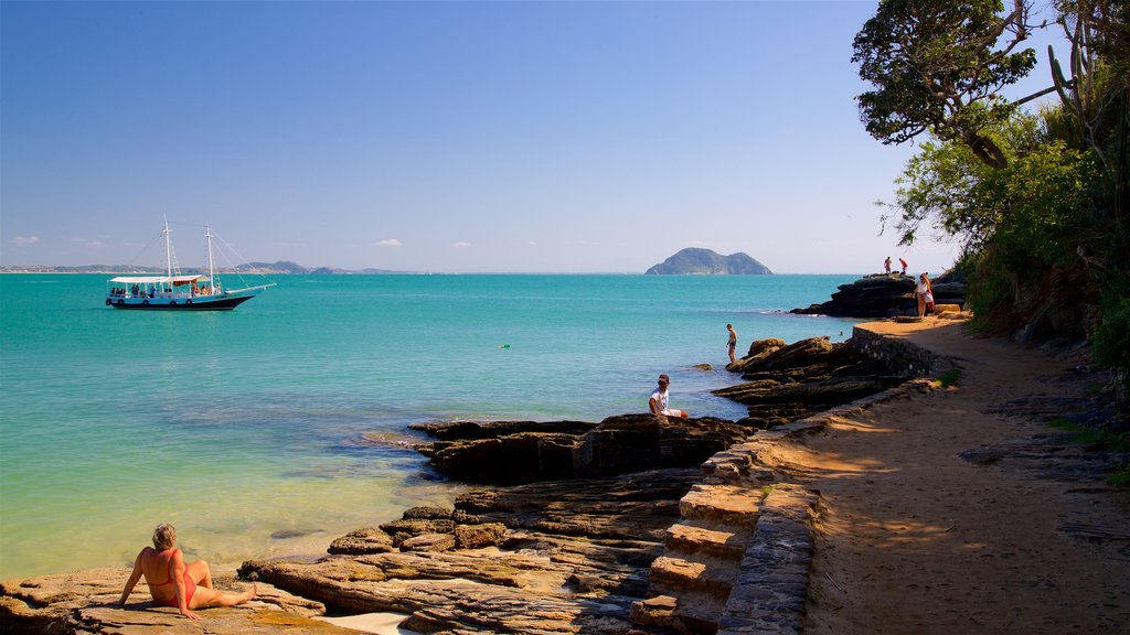 Playa Azeda mostrando vistas generales de la costa y también una mujer