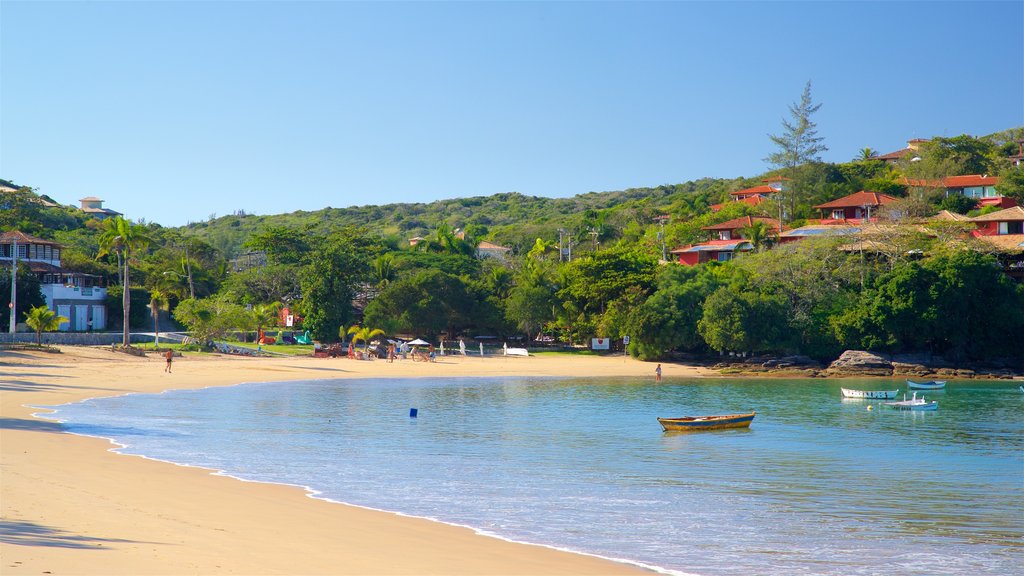 Ferradura Beach which includes general coastal views and a beach