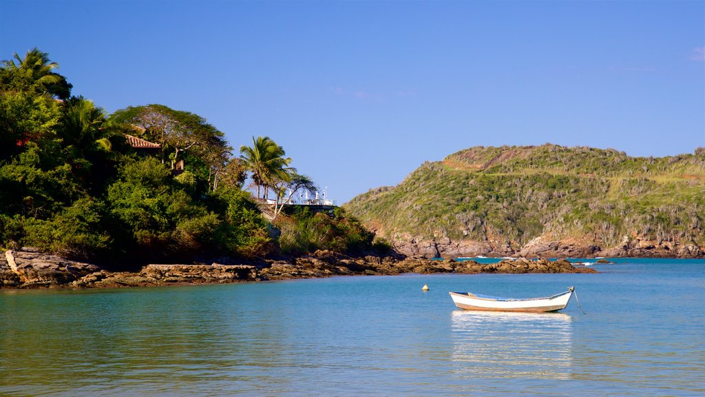 Ferradura Beach showing rocky coastline and general coastal views